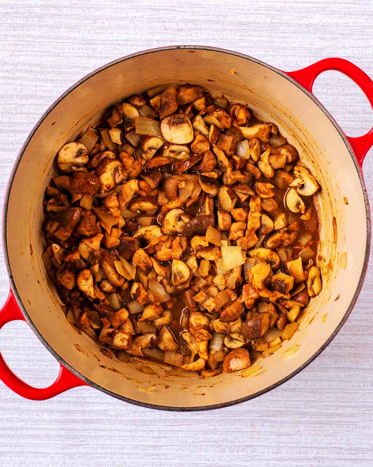 Curry powder added to the pan.