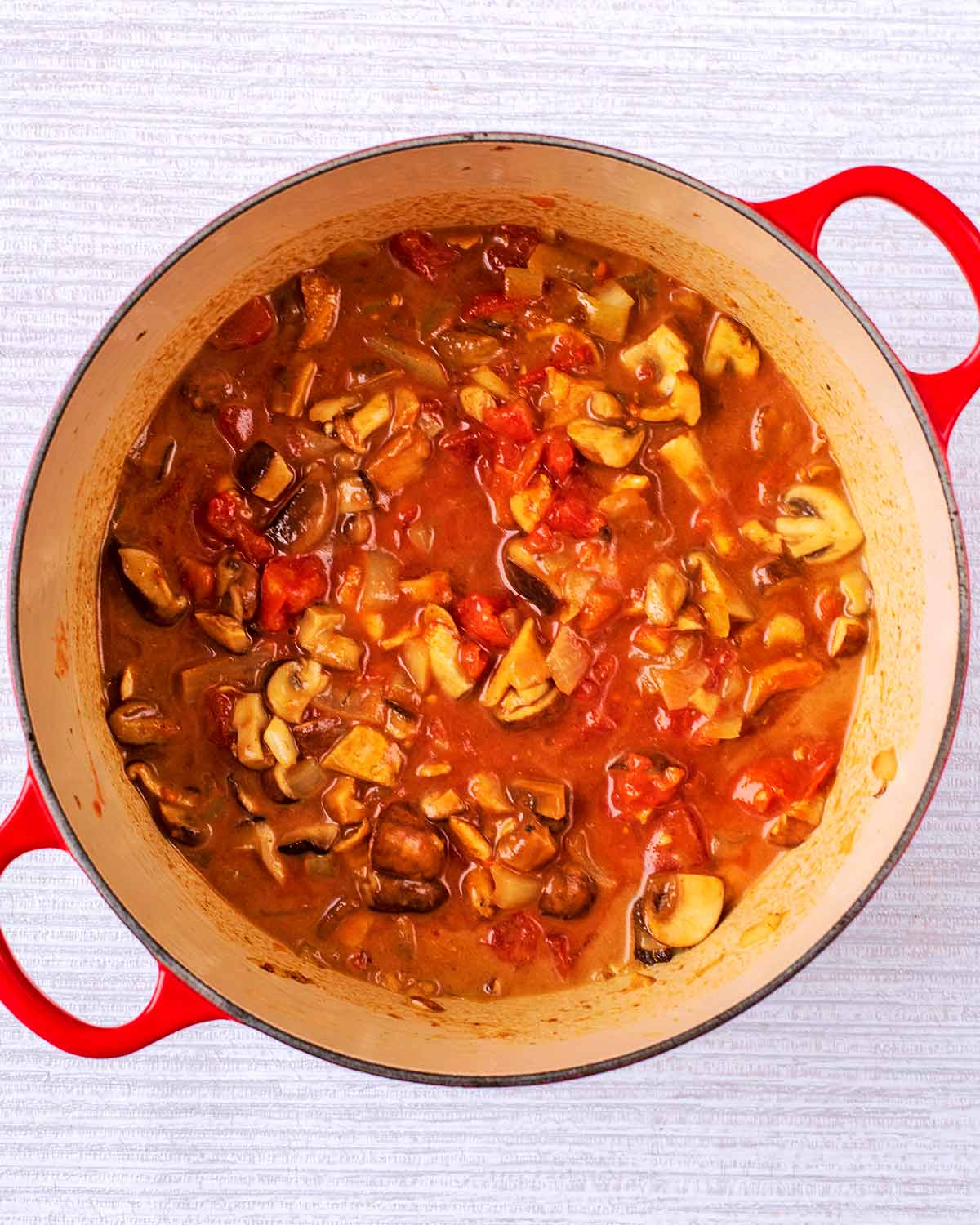 Cooked mushroom curry in the pan.
