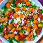 Roasted Butternut Squash Salad in a large white bowl.