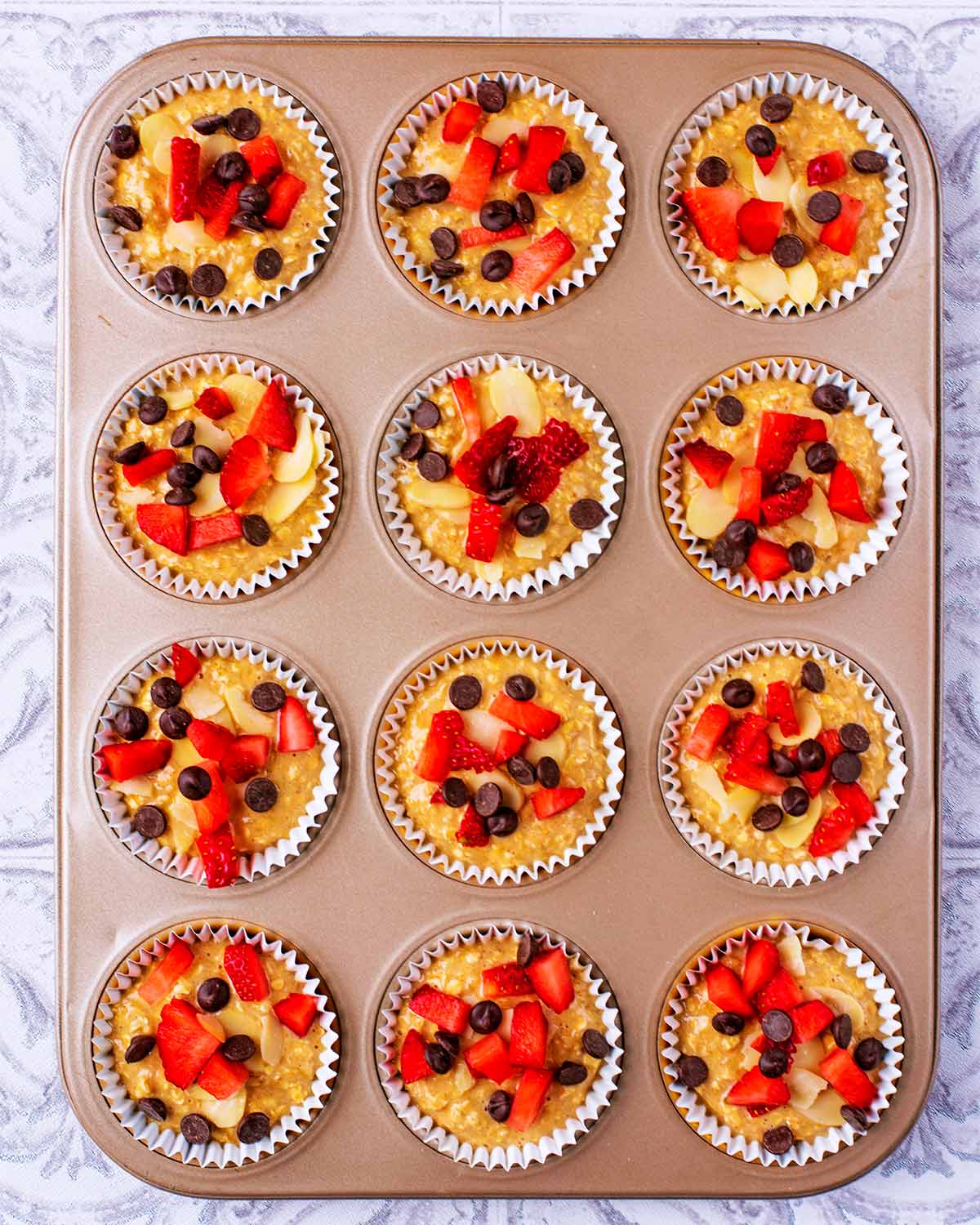 More berries, chocolate chips and almonds added to the top of the batter.