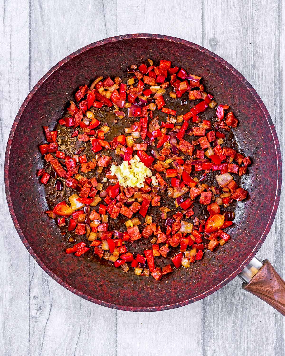 Chorizo, garlic and chilli added to the pan.