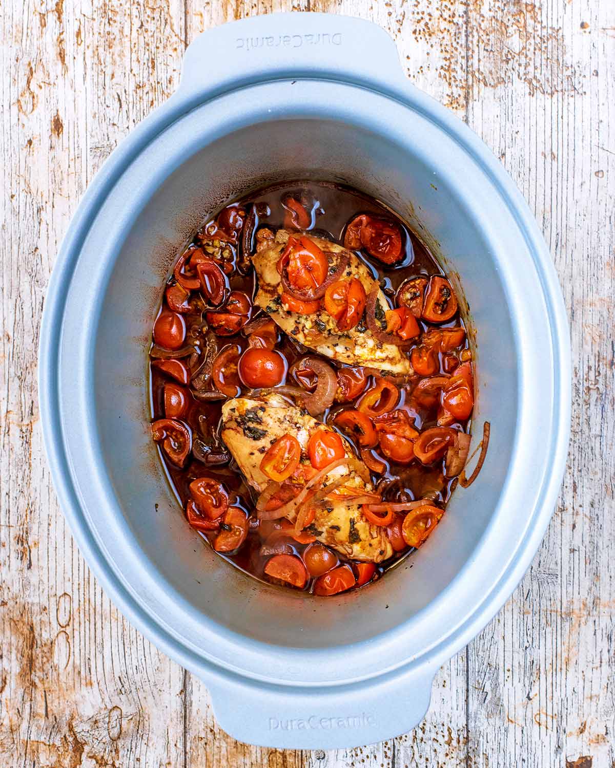 Cooked balsamic chicken in the slow cooker.