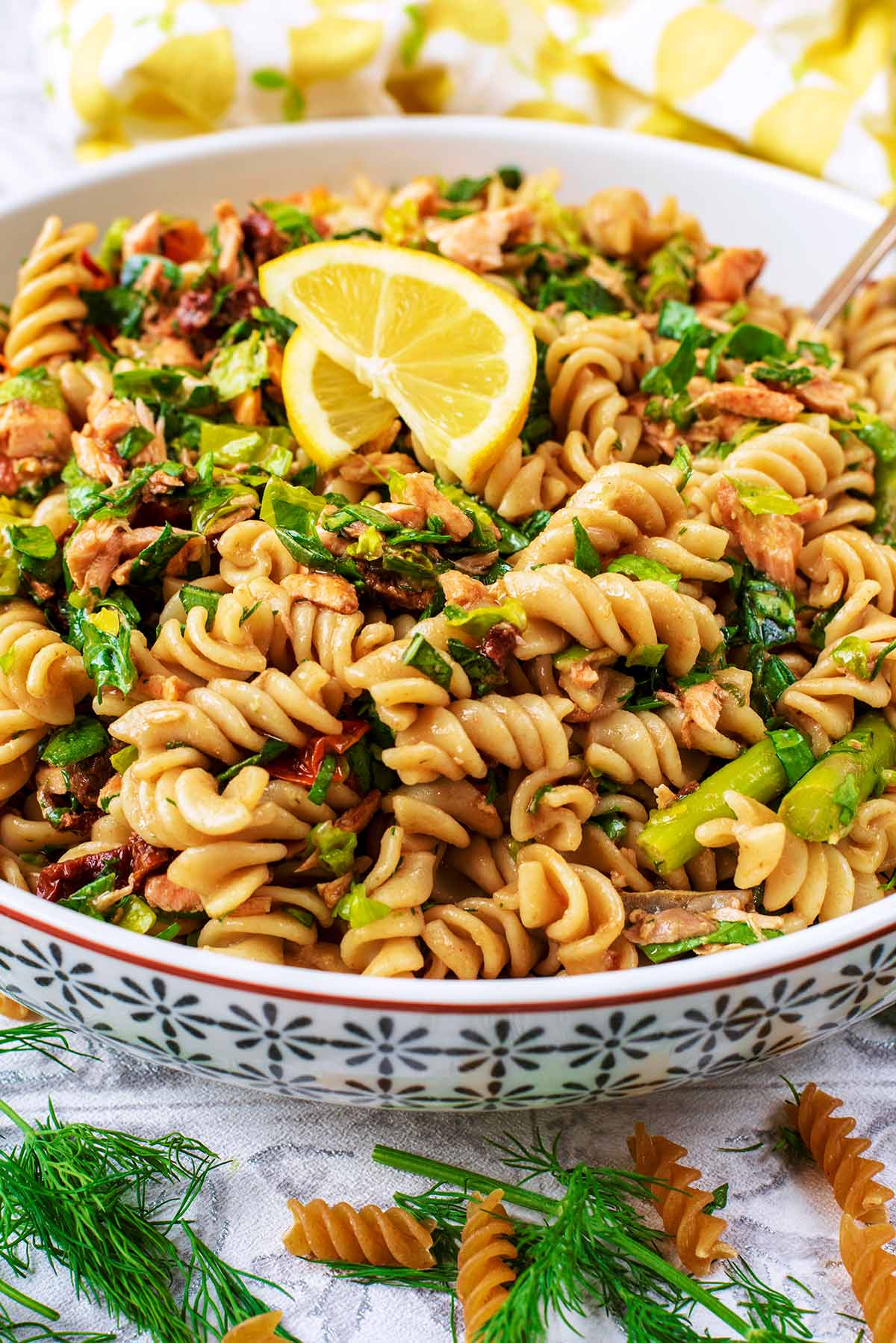 A large dish of pasta salad.