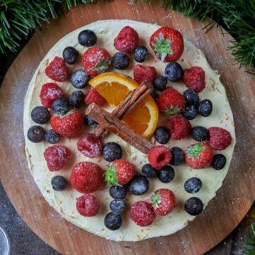 Christmas Cheesecake on a wooden board.