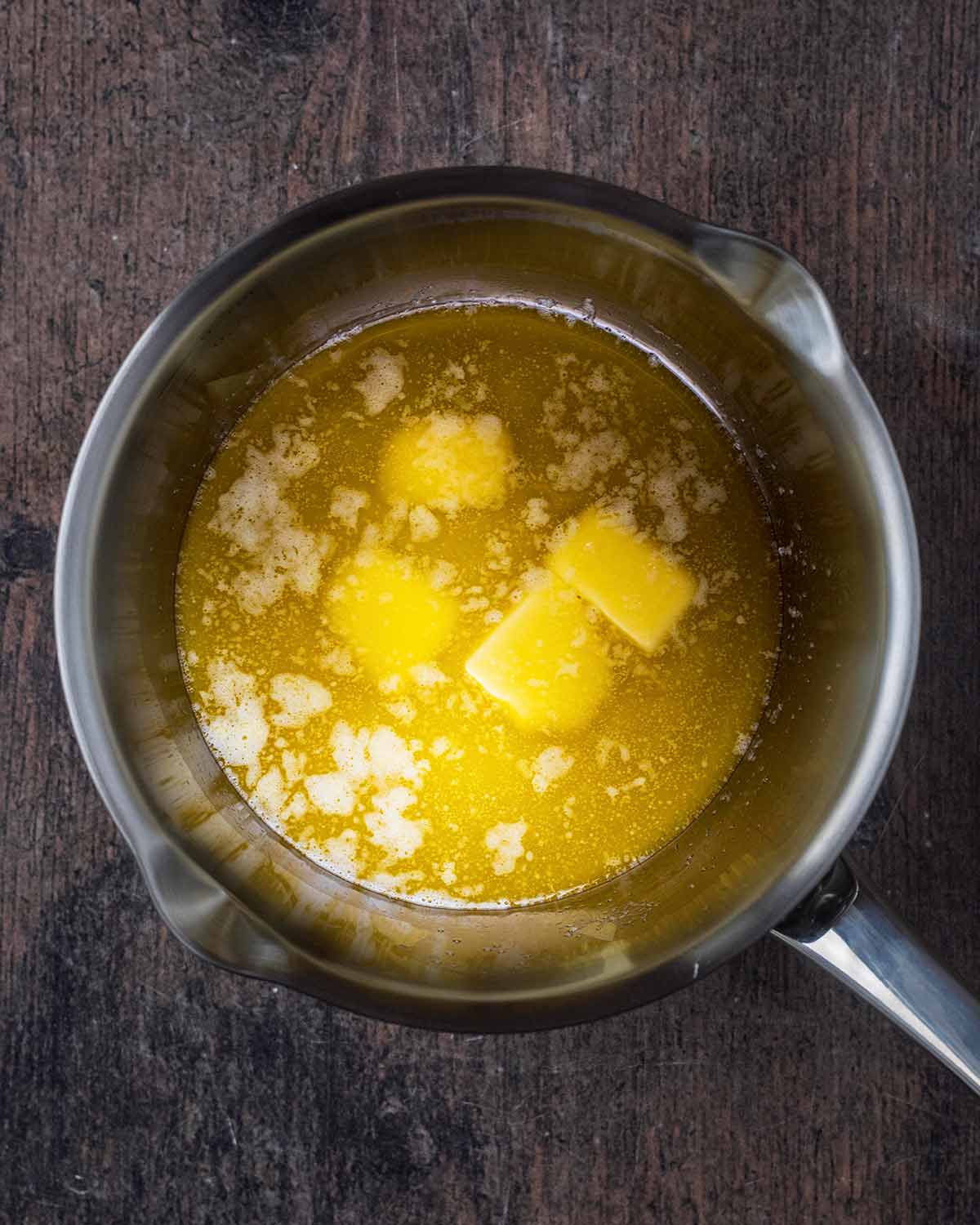 Butter melting in a saucepan.