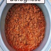 Slow cooker bolognese with a text overlay title.