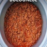 Slow cooker bolognese with a text overlay title.