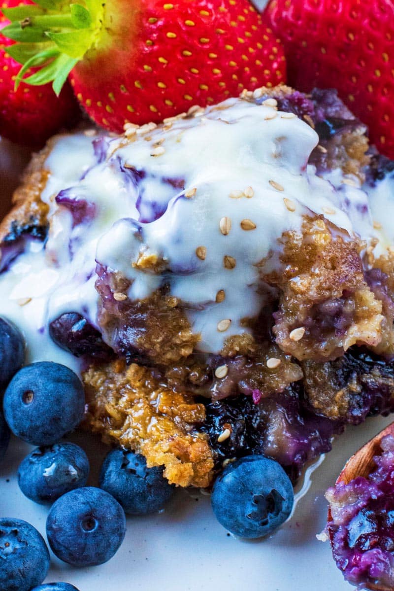 Baked oats covered in yoghurt with fruit.