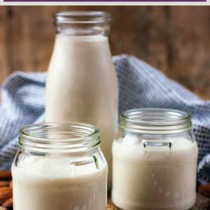 Jars of homemade almond milk with a text title overlay.