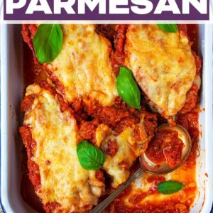 A tray of eggplant parmesan with a text title overlay.