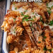 Bolognese pasta bake with a text overlay title.