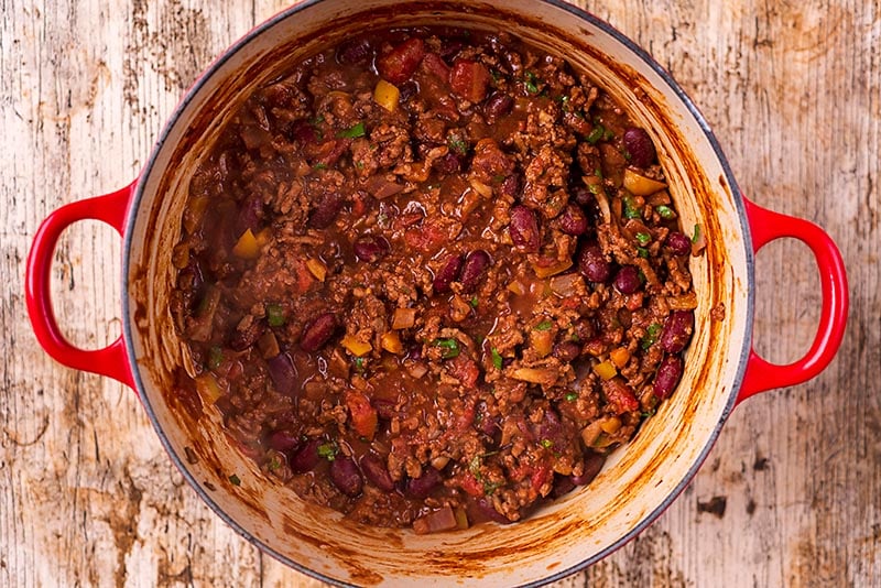 A large red pot full of chilli con carne