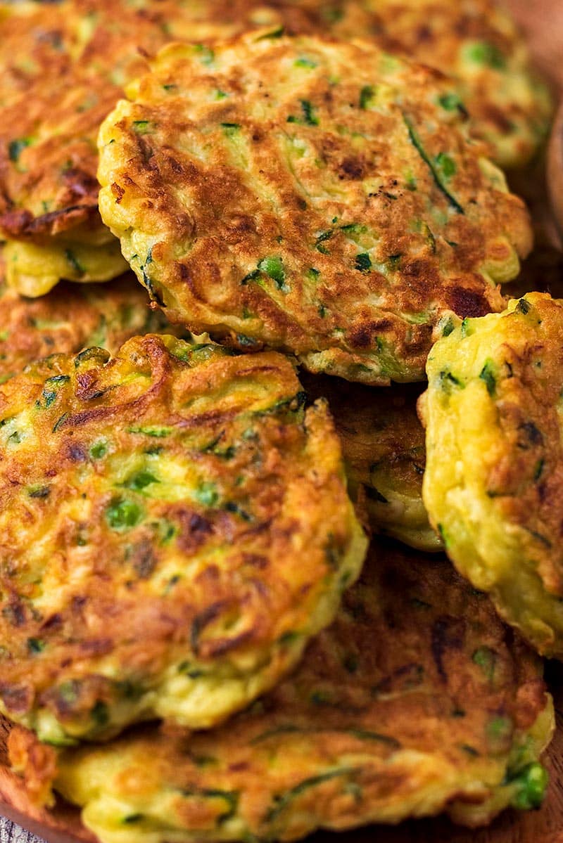 A pile of cooked courgette fritters.