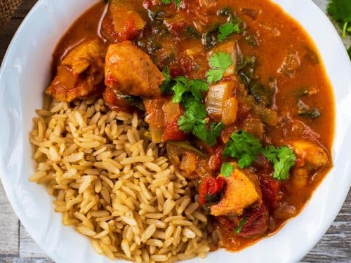 Easy Slow Cooker Chicken Curry in a bowl with some brown rice