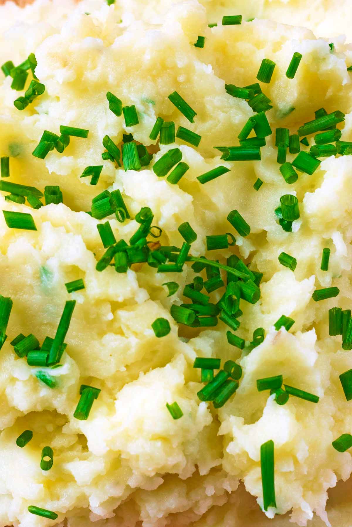 Chopped chives on the top of mashed potato.
