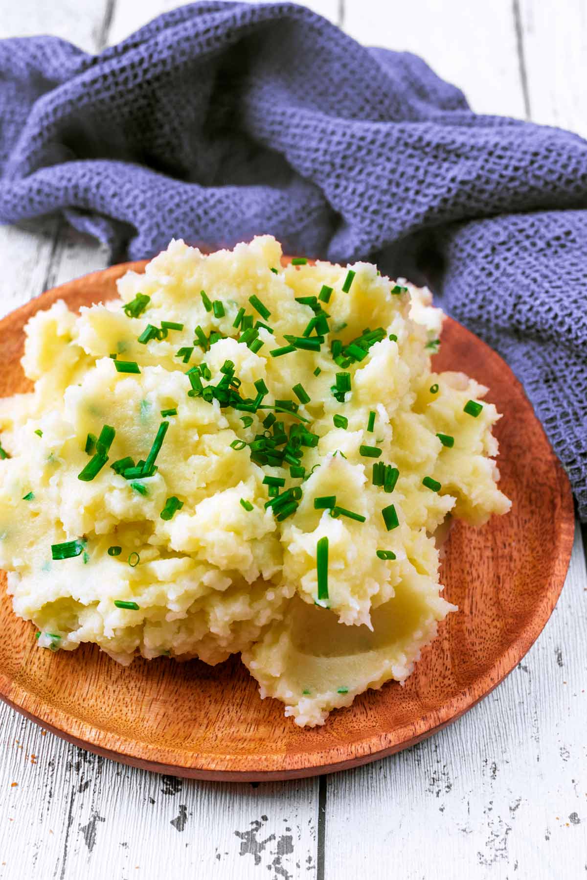 A plate of mash potato and chives.