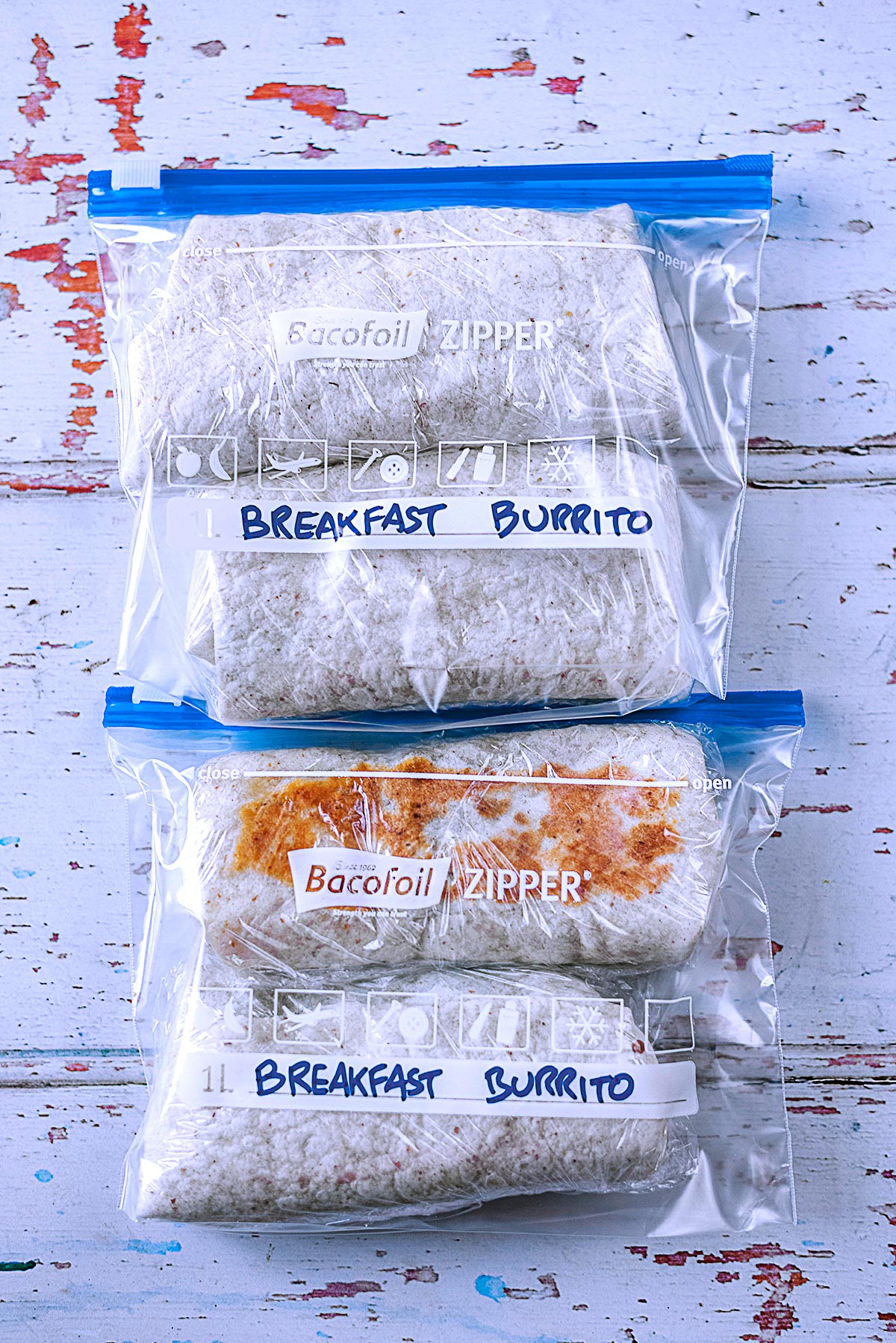 Four burritos in zip lock bags labelled with name and date.