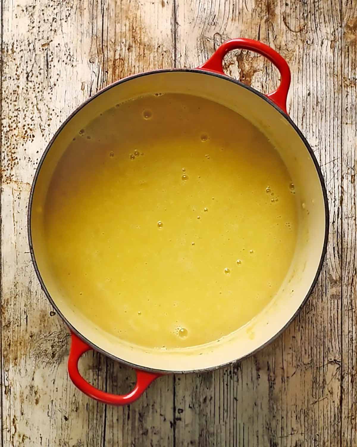Blended soup in a large pan.