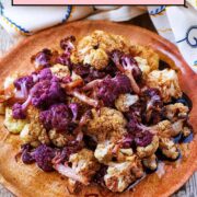 Garlic roasted cauliflower with a text overlay title.