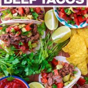 Shredded beef tacos with a text title overlay.