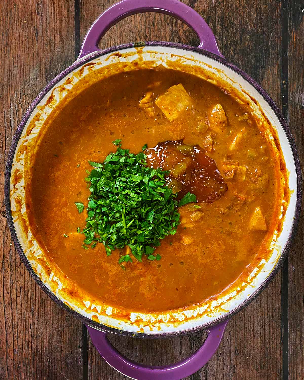 Mango chutney and chopped coriander added to the curry.