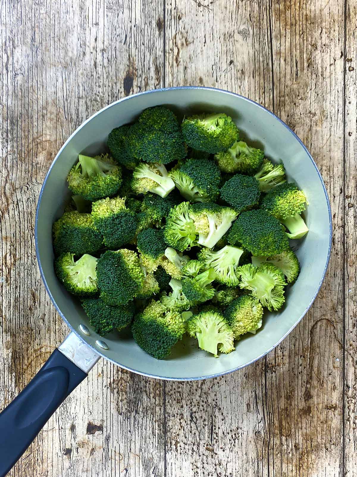 A pan of broccoli florets.