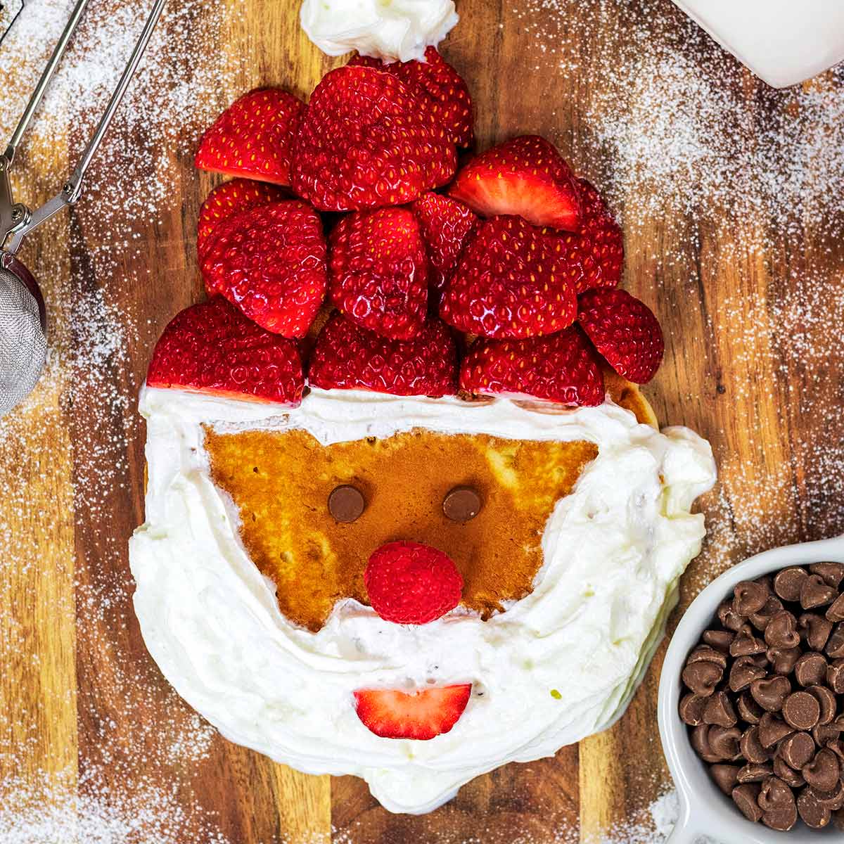 A pancake decorated like the face of Santa.