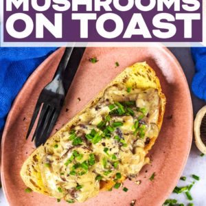 Creamy mushrooms on toast on a plate with a title text overlay.
