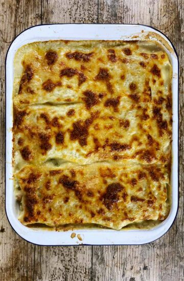 Lasagna fresh out of the oven with a golden brown top.