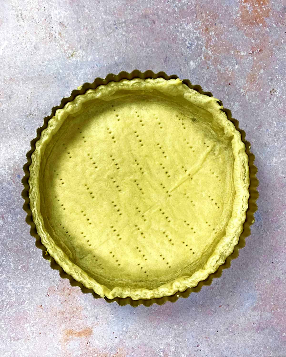 Baked pastry in a pie tin.