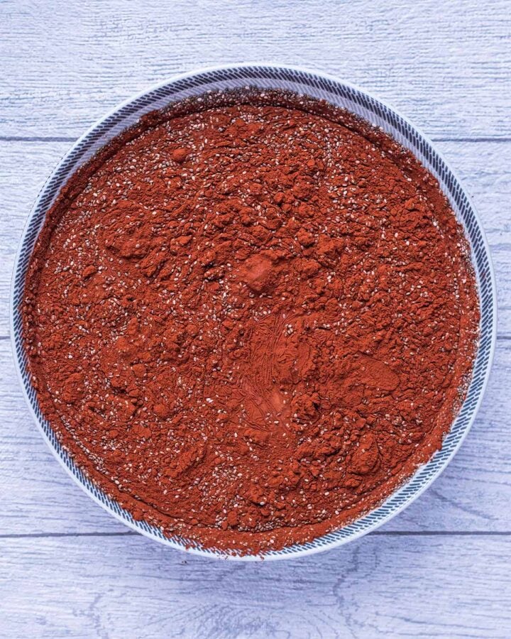 Unmixed chocolate pudding in a large dish.