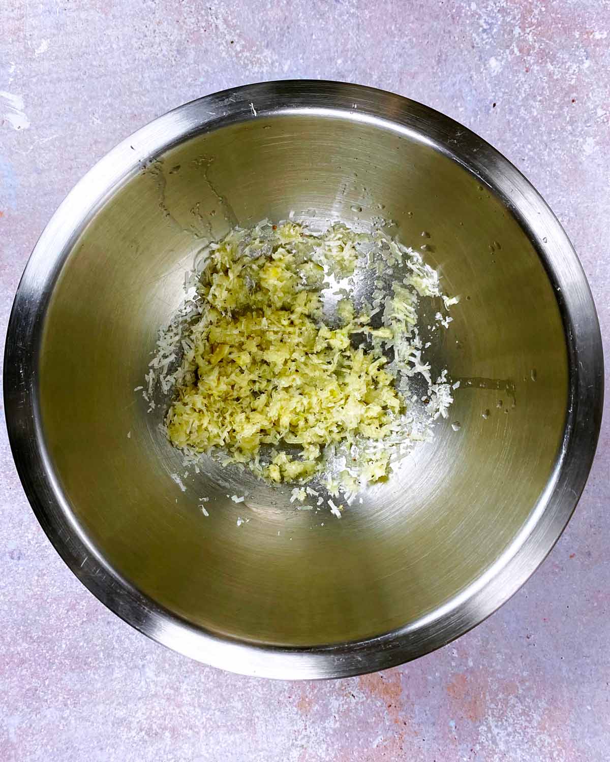 Parmesan added to the bowl.