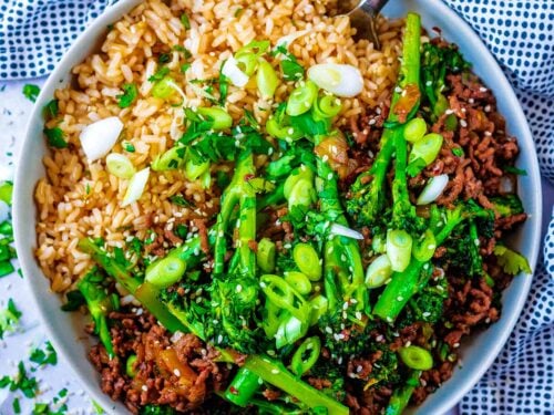 Sticky Ginger Beef in a bowl with rice and broccoli.