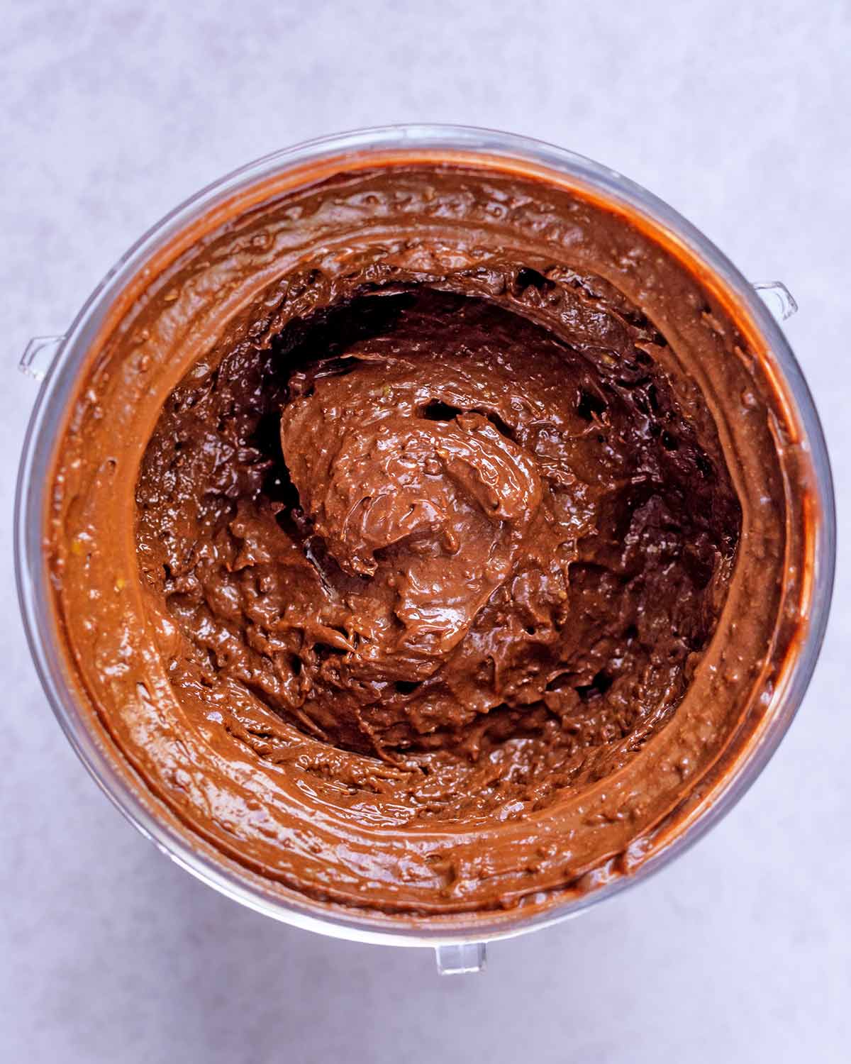 Blended chocolate pudding in a blender jug.