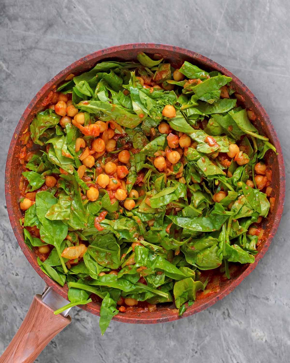 Spinach added to the pan.