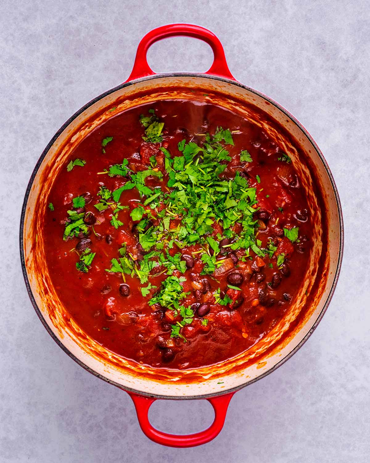 Chopped coriander added to the pan.