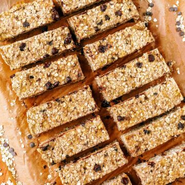 Fourteen healthy flapjacks on a sheet of parchment paper.