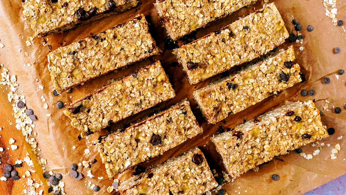 Bars of flapjacks on a sheet of baking paper.
