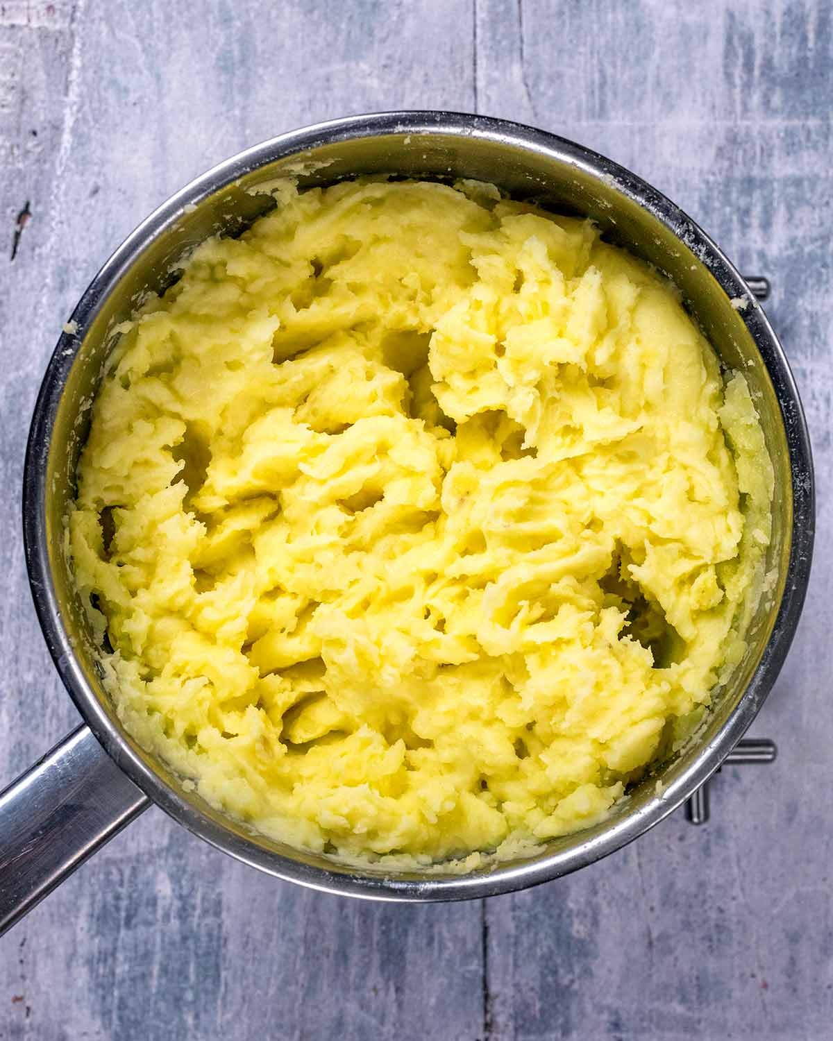 A saucepan of mashed potato.