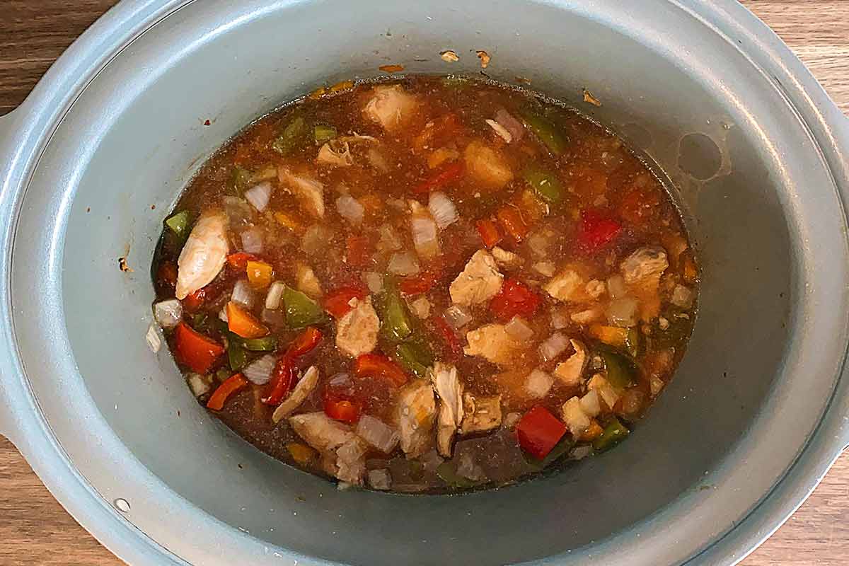 Sweet and sour chicken in a slow cooker.