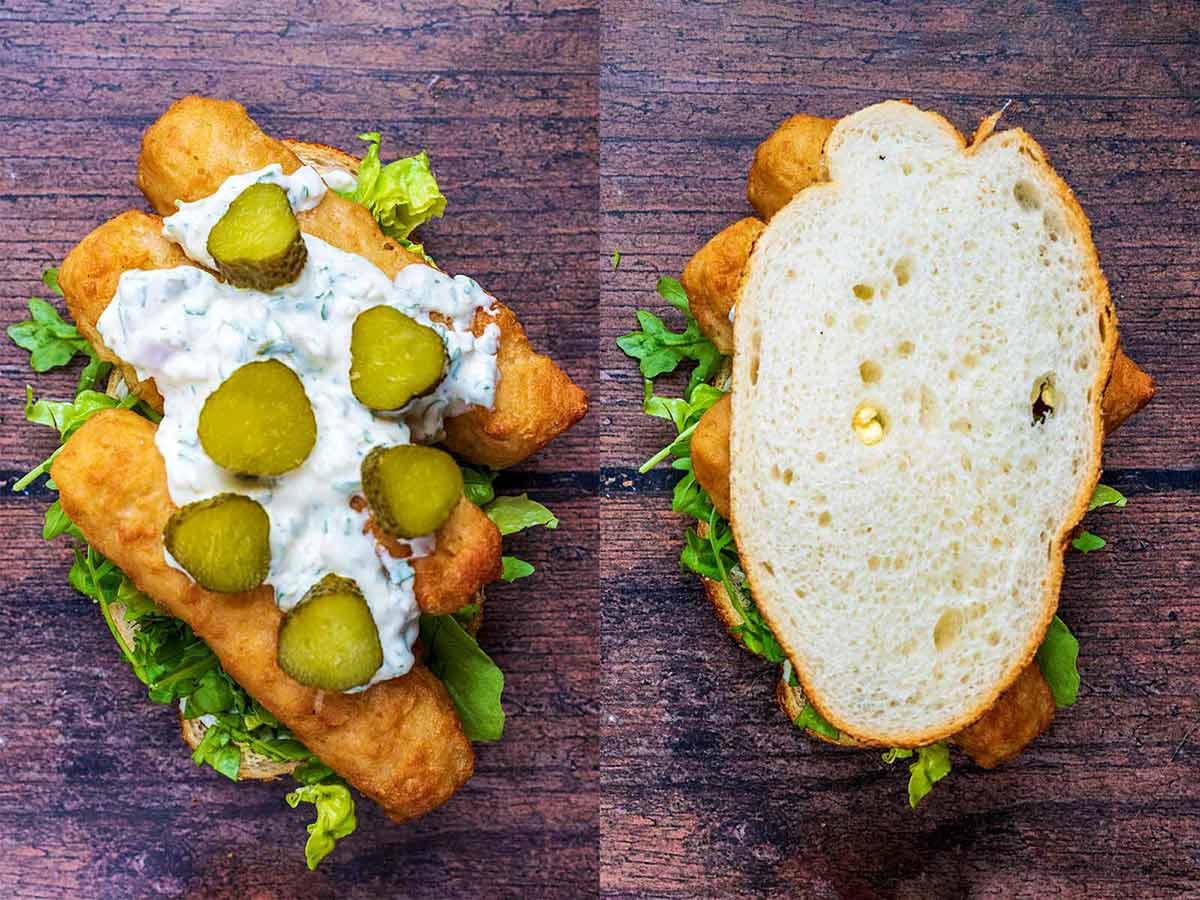 Fish fingers in a sandwich topped with tartare sauce and gherkins, then another slice of bread.