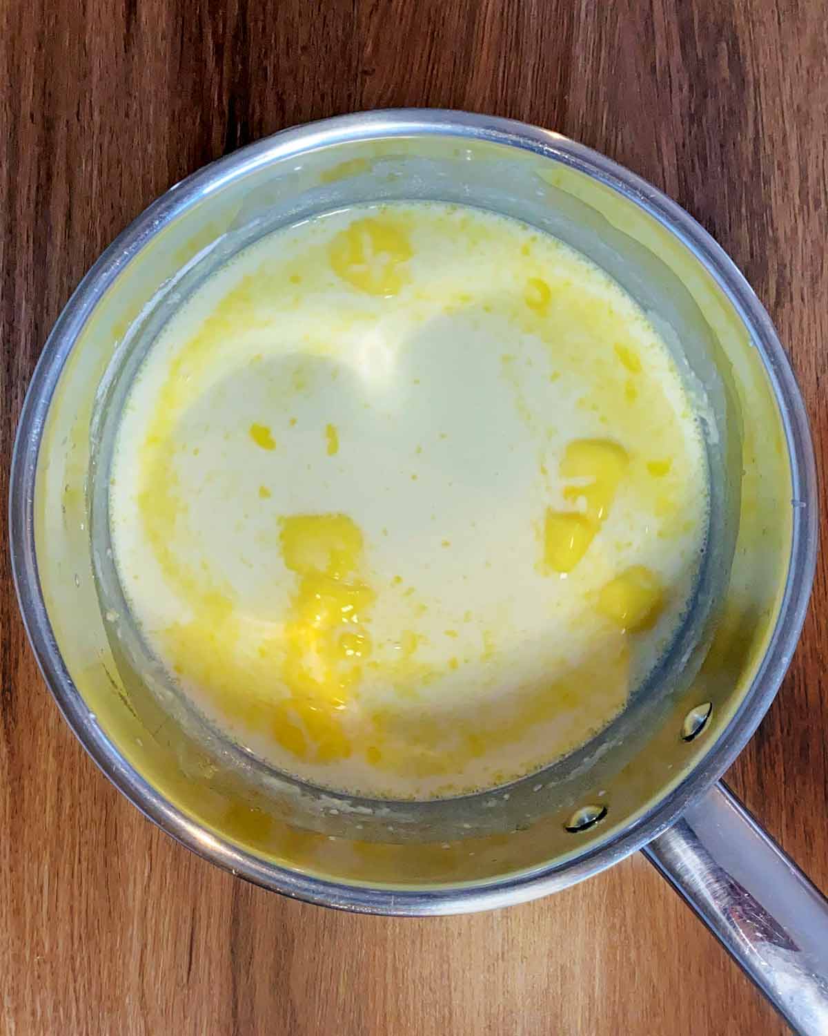 Melted butter and milk in a saucepan.