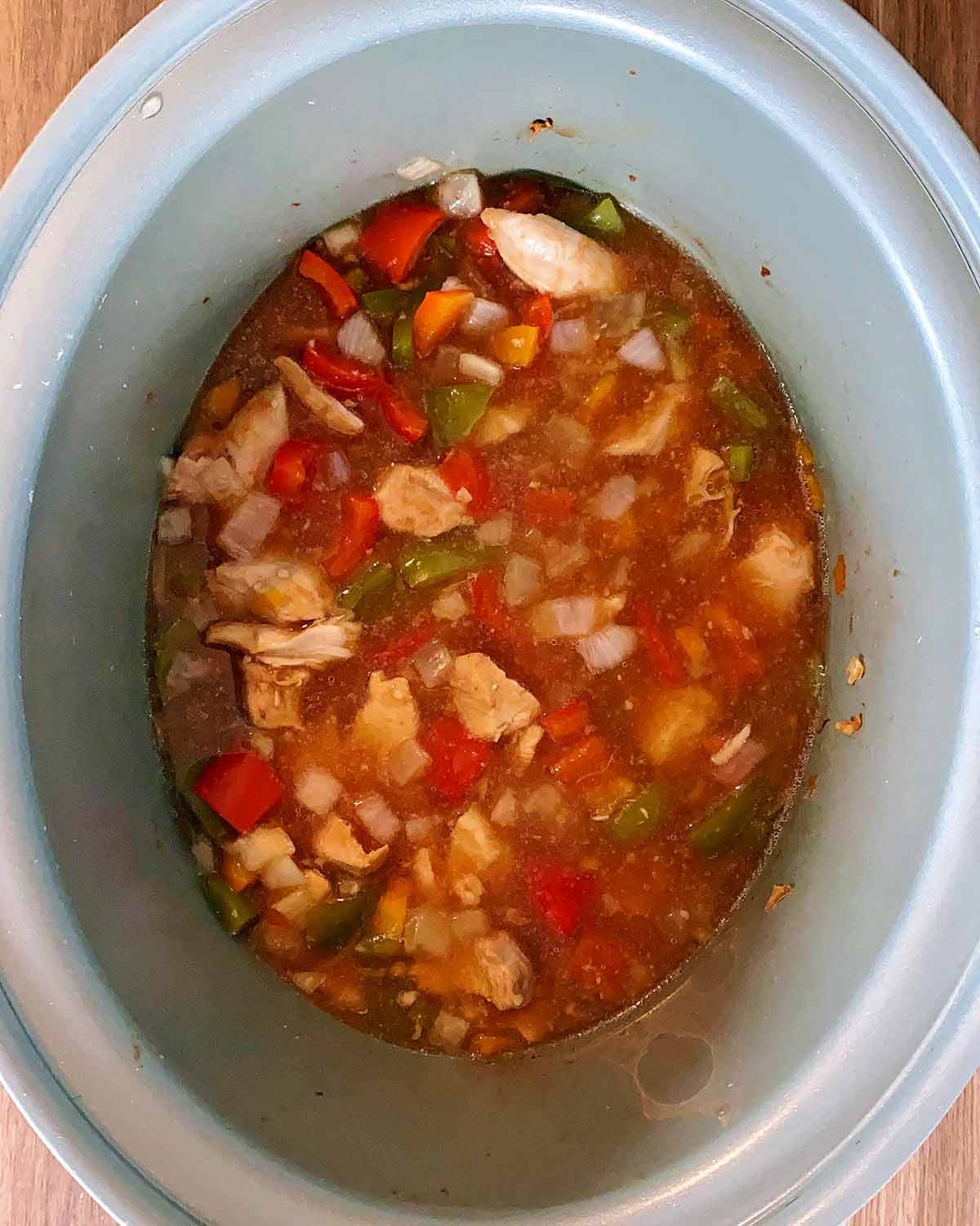 Sweet and sour chicken in a slow cooker.