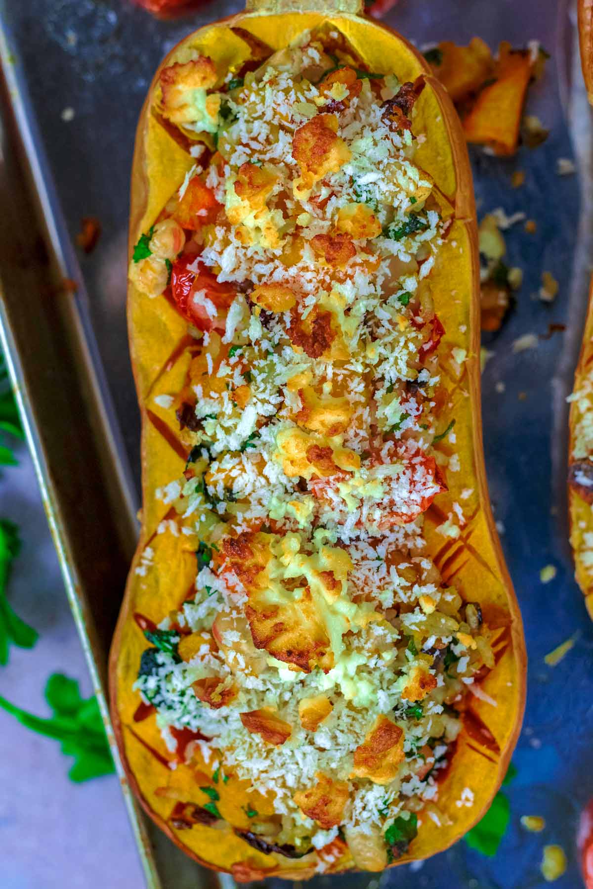 Half a butternut squash stuffed with rice, cheese and vegetables.