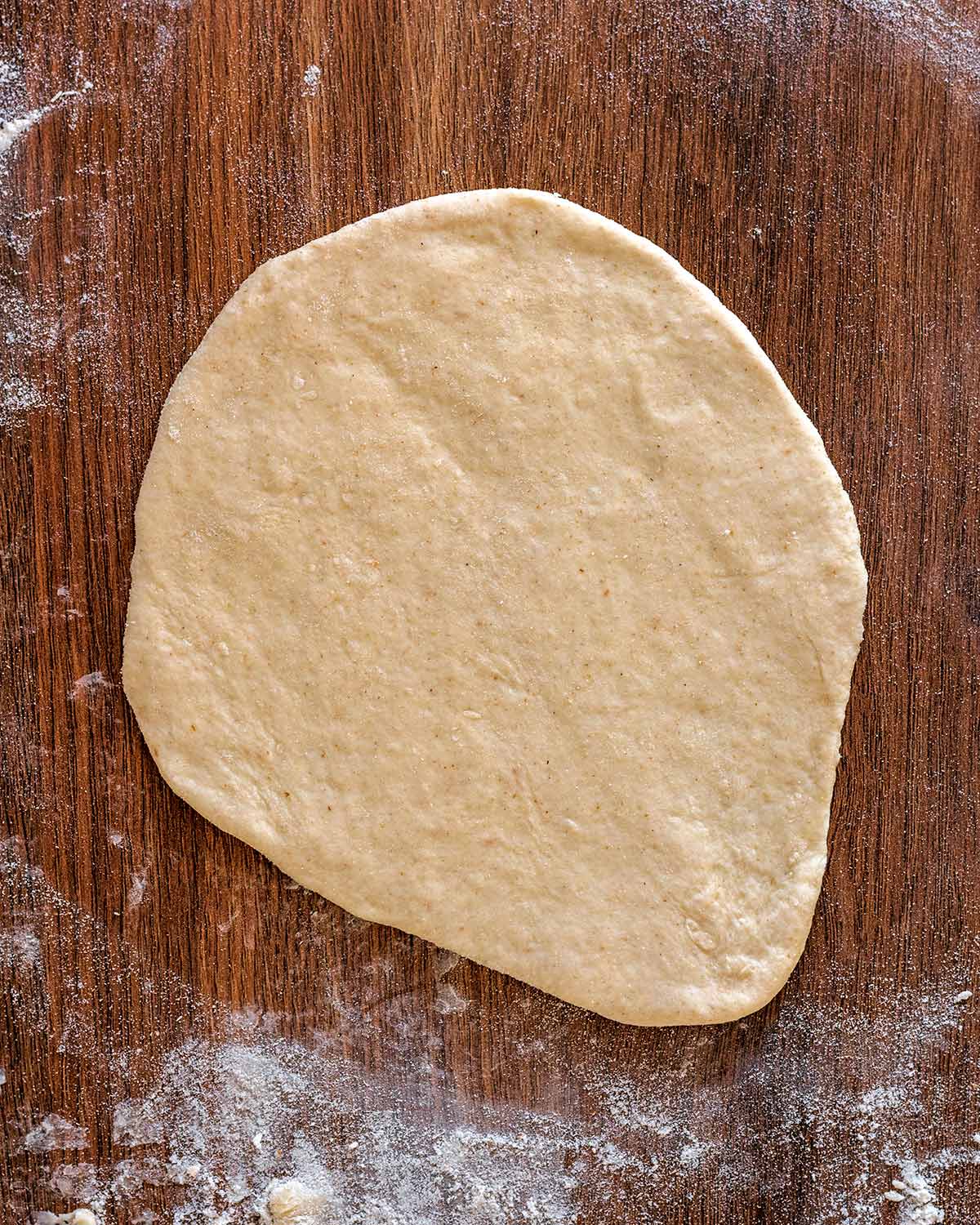 A piece of dough rolled out into a teardrop shape.