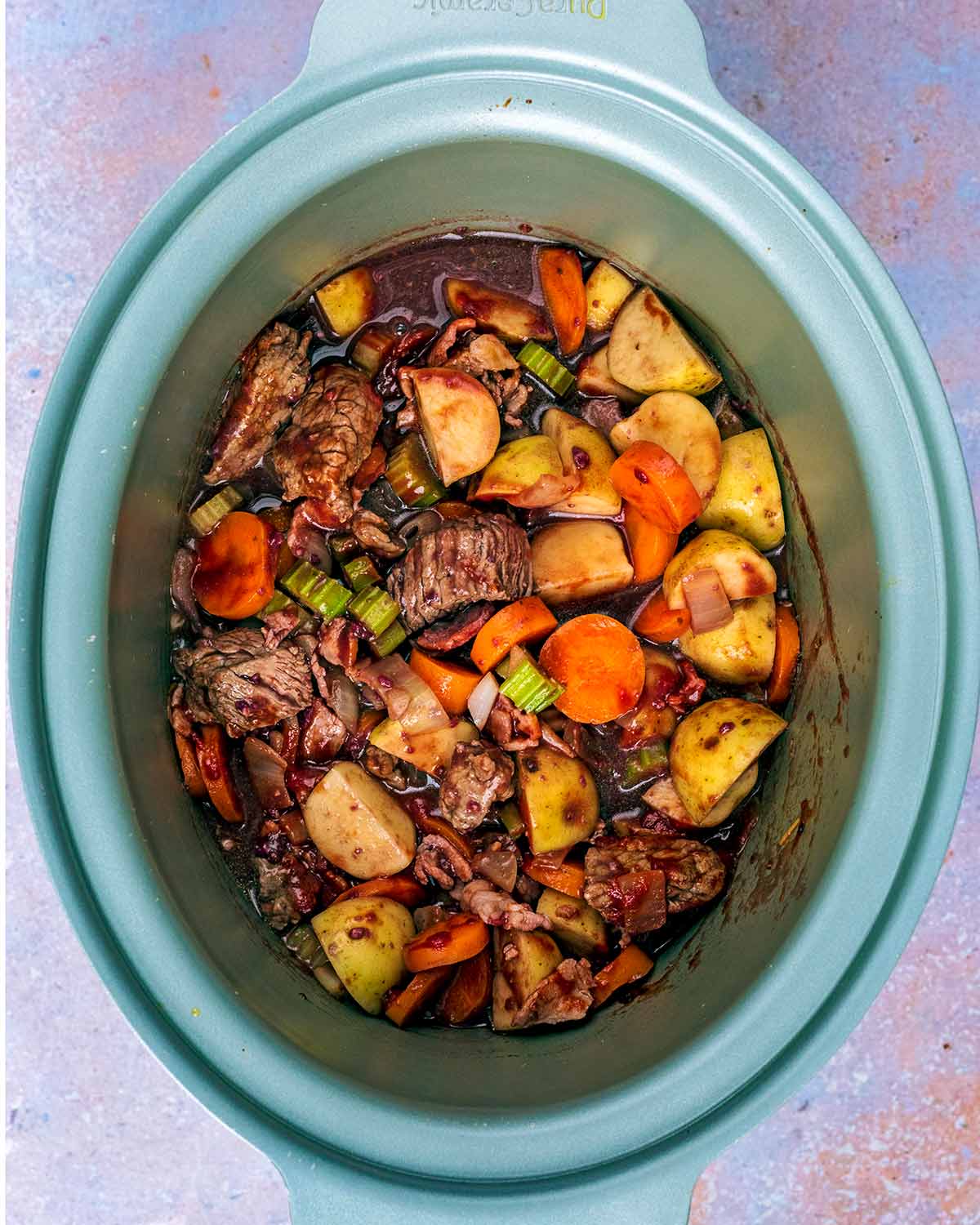 Cooked bourguignon in a slow cooker.