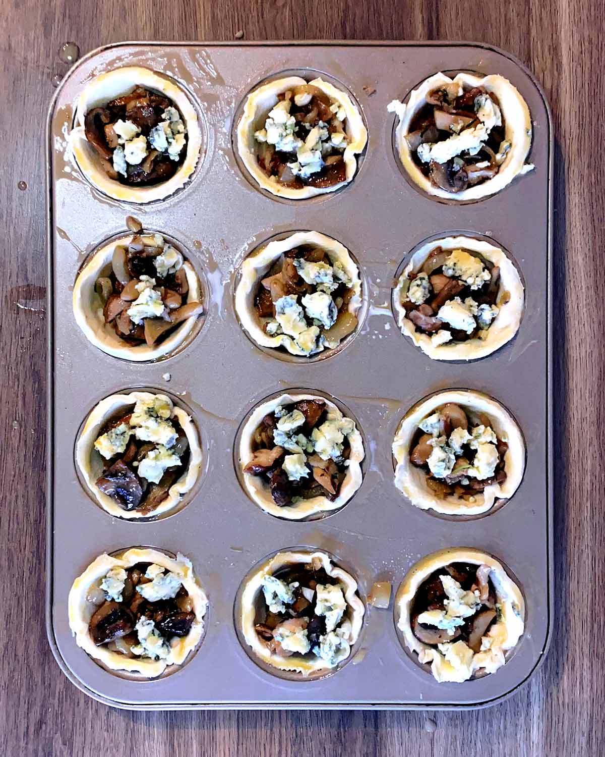 Stilton added to the cups.