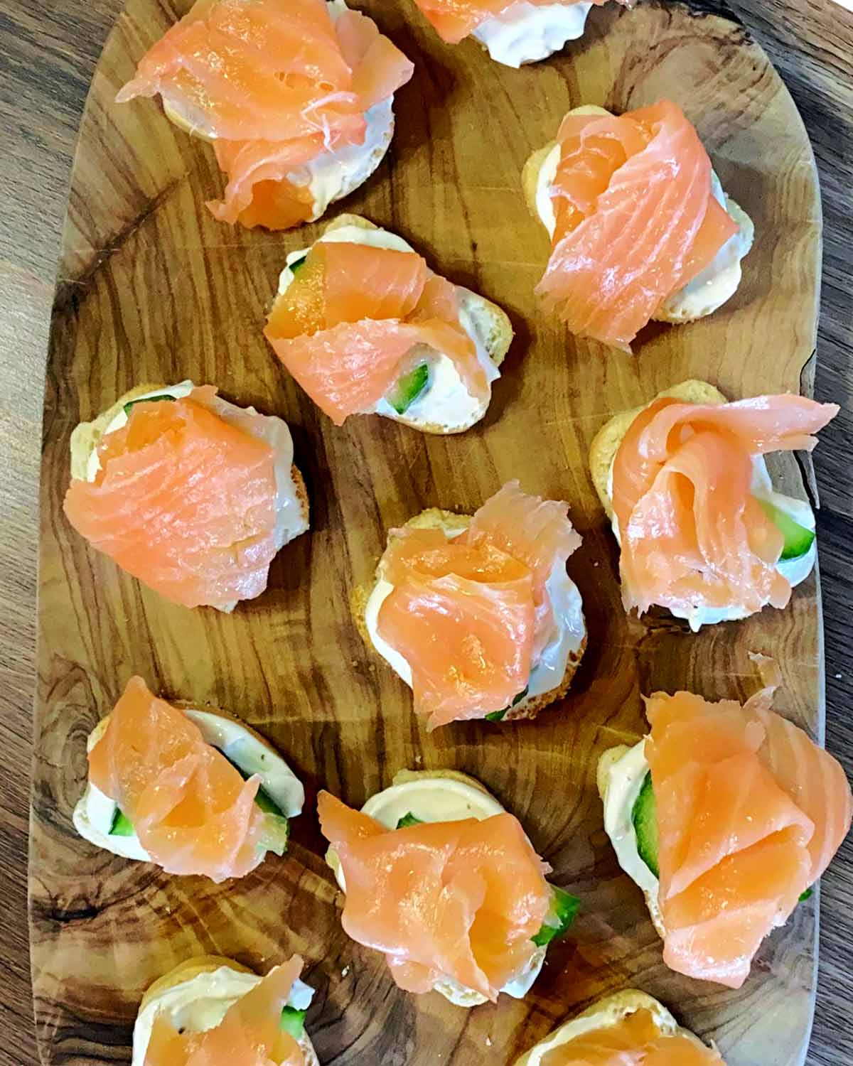 A piece of smoked salmon added to each crostini.