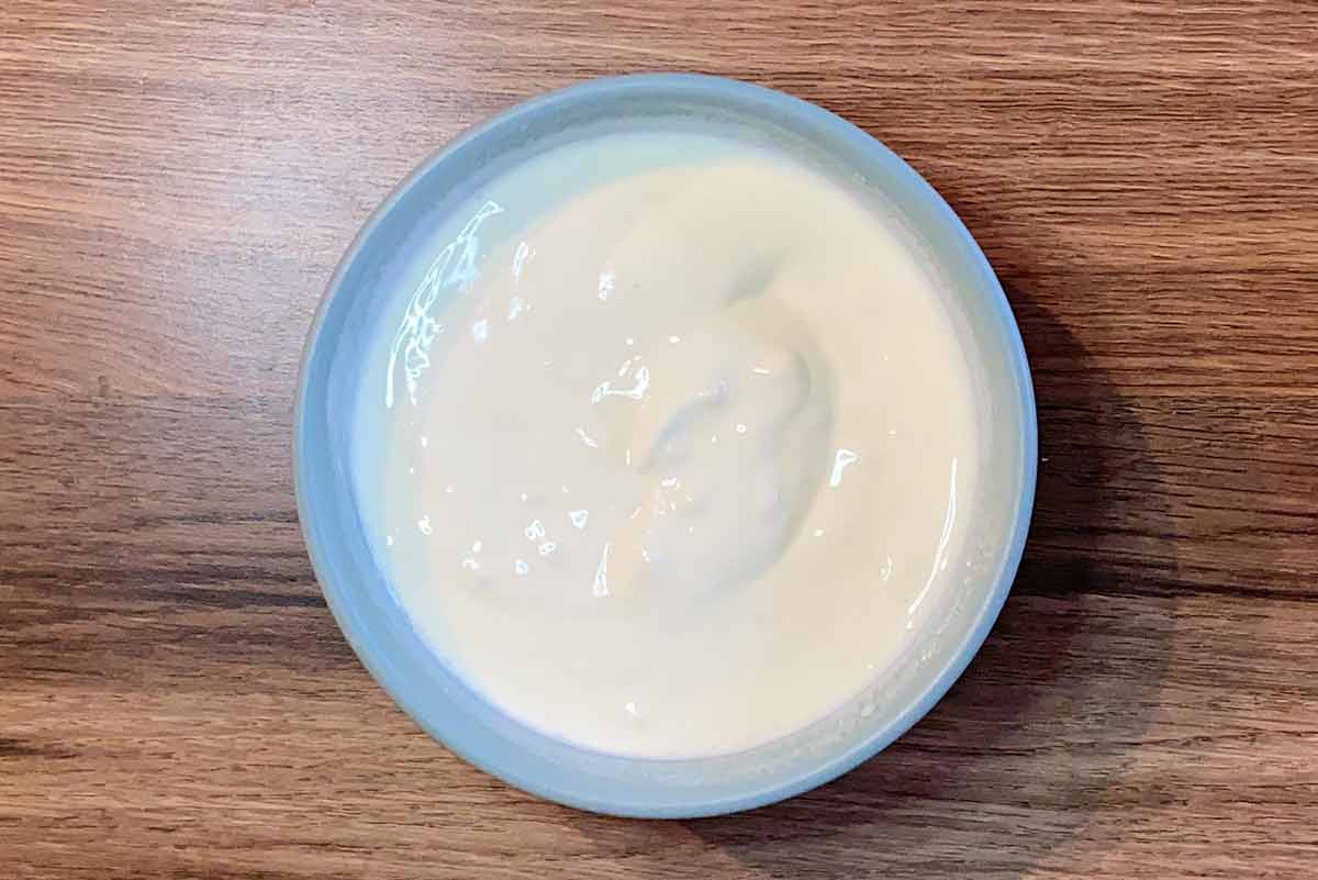Yogurt sauce mixed together in a bowl.