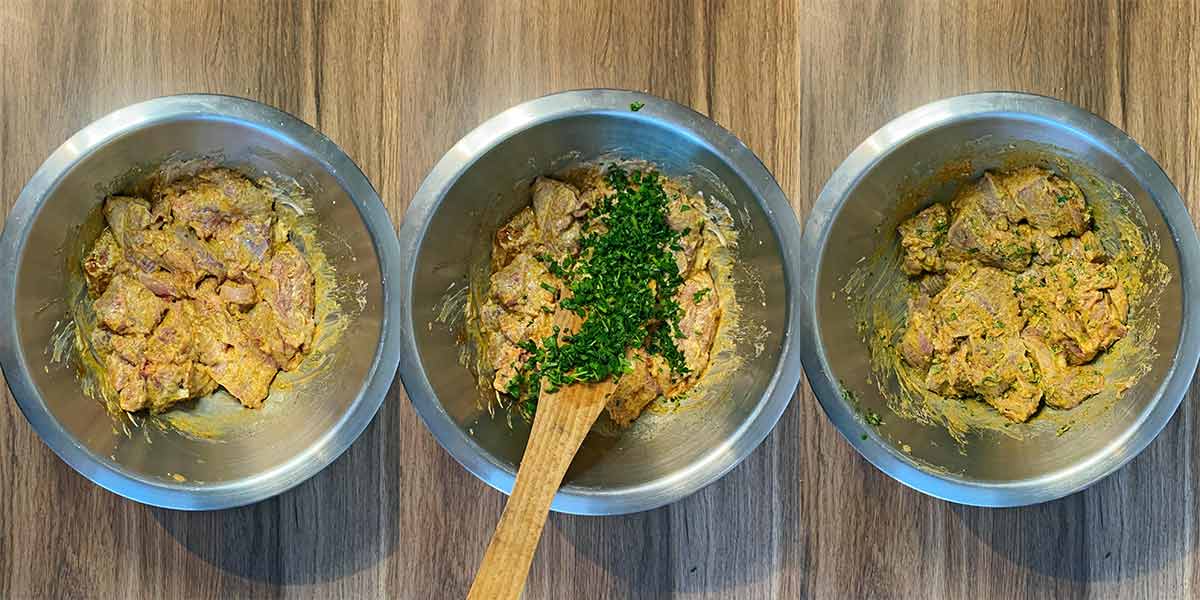 Marinated lamb chunks in a bowl mixed with chopped herbs.